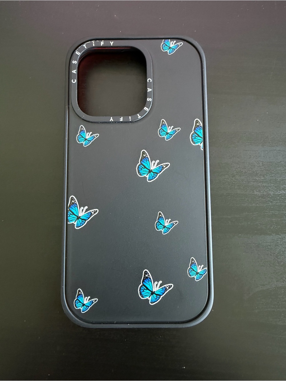 Casetify Black Impact Case with Blue Butterfly Design - iPhone 14 Pro